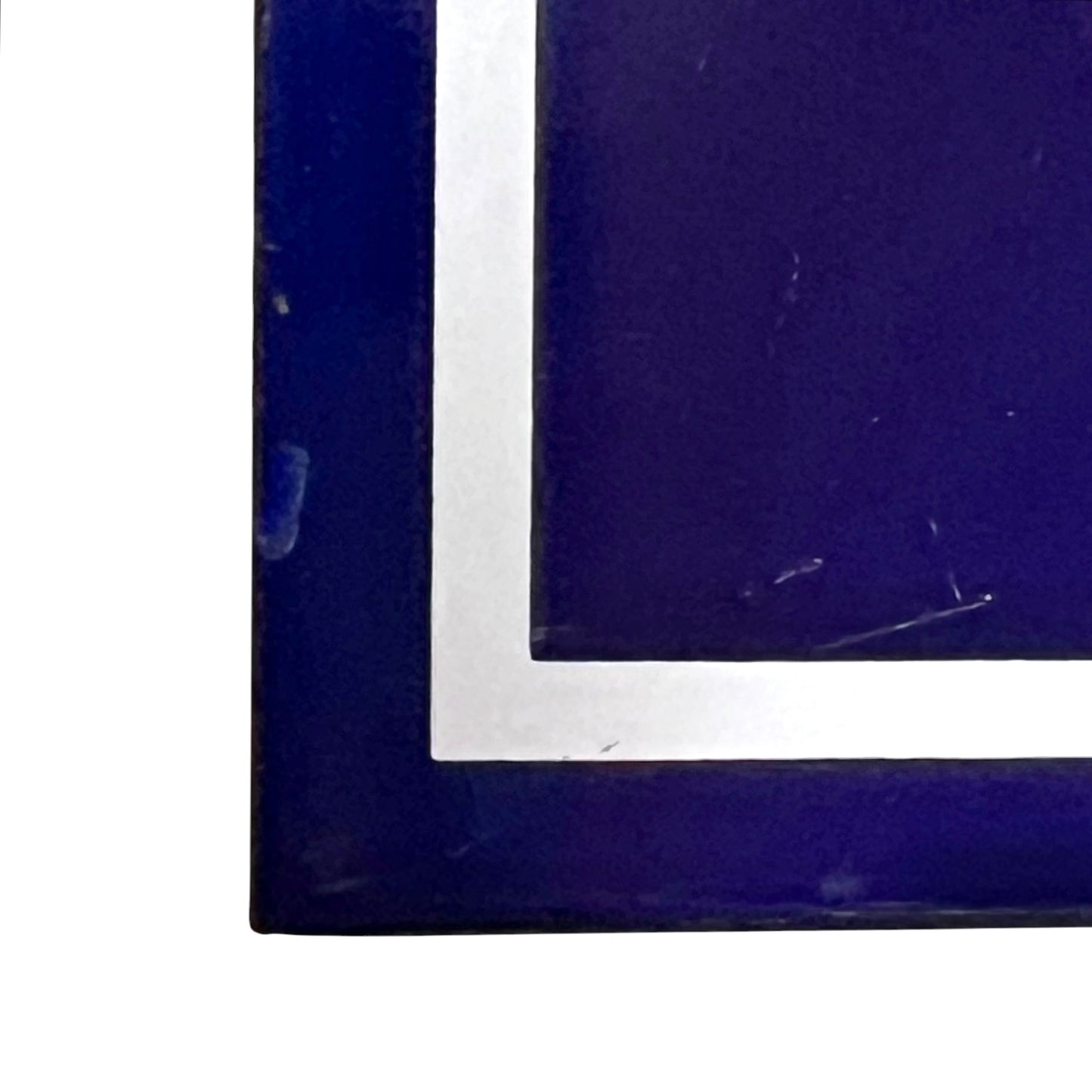close up of a french blue door sign with white number '43' on a white background