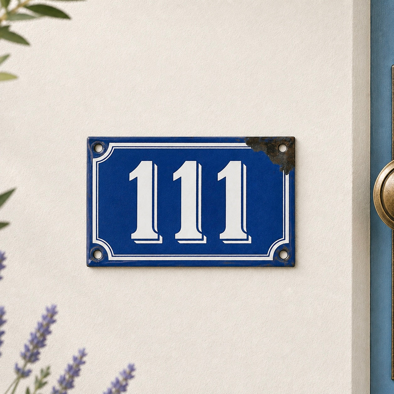 Blue house number plate with '111' on a white wall.
