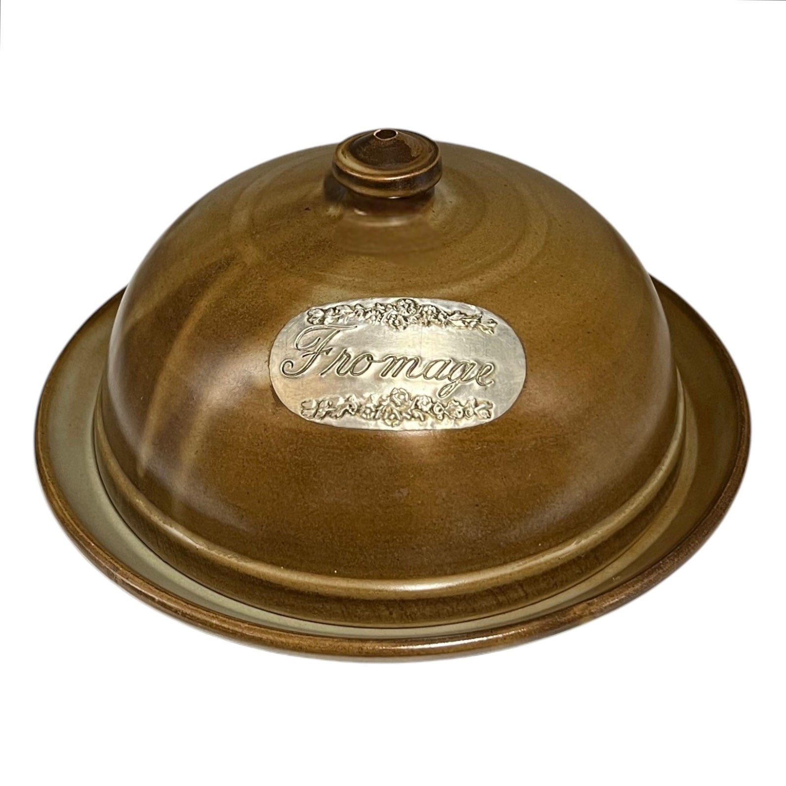 Brown dome-shaped object with 'Fromage' branding on a white background