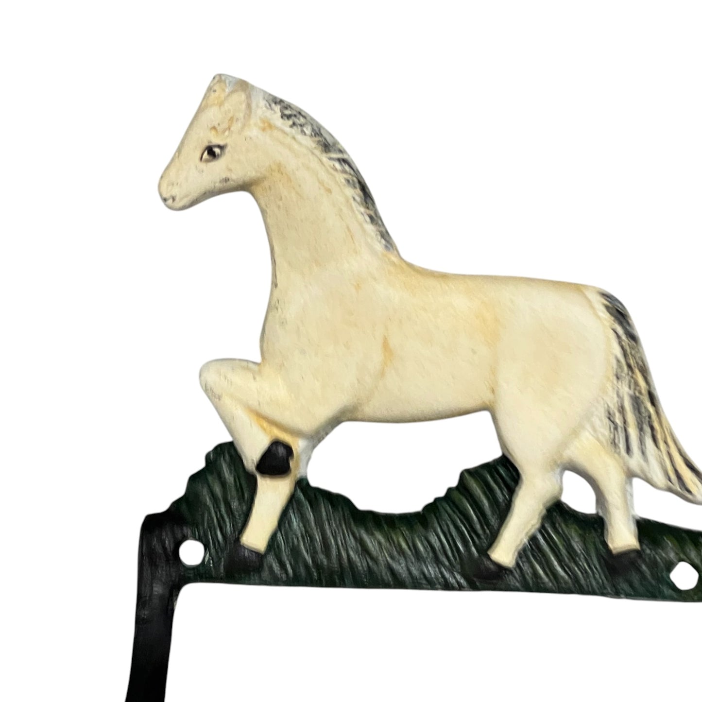 Decorative horse toilet paper holder on a white background