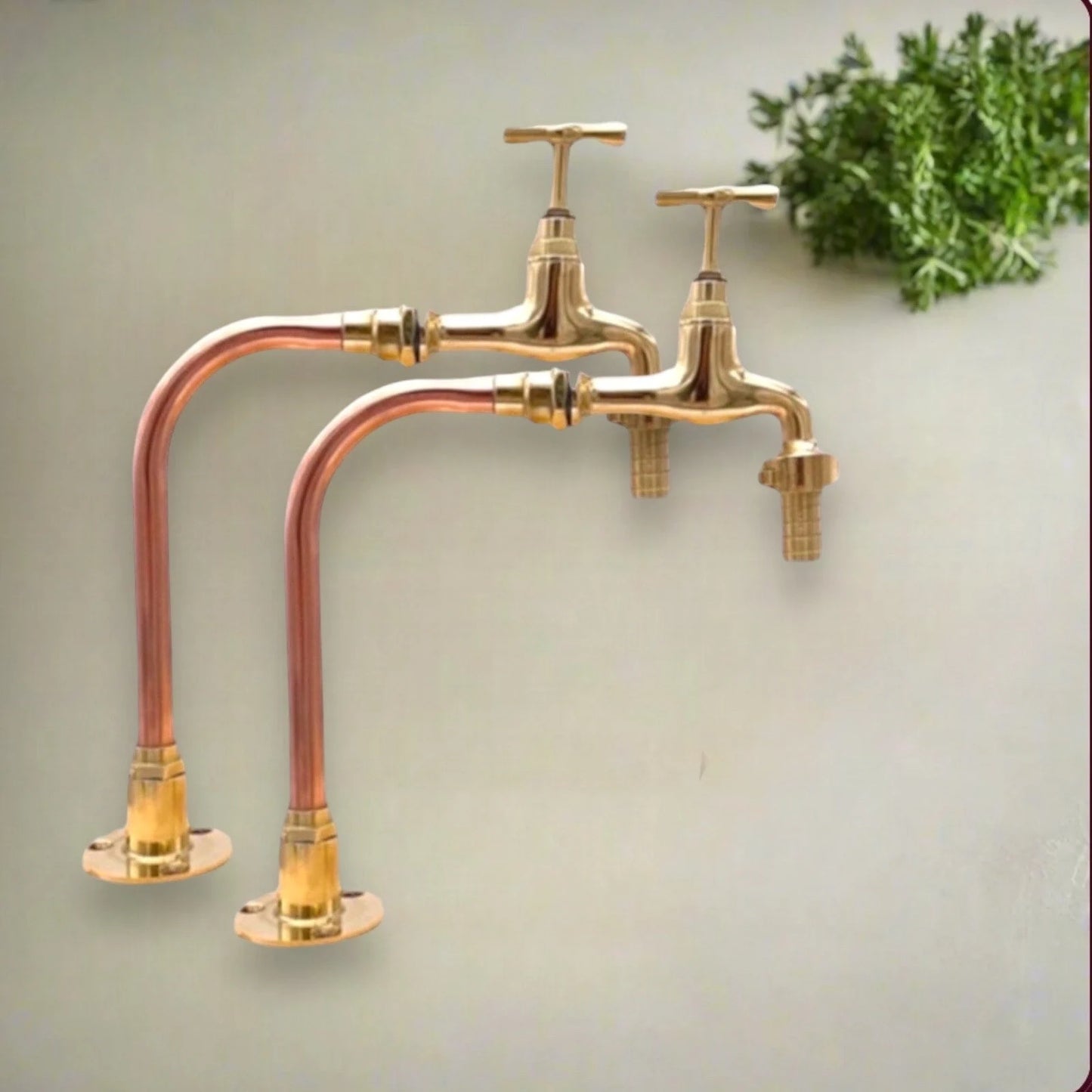 Pair of handmade copper and brass swan neck taps with detachable nozzle sold by All Things French Store