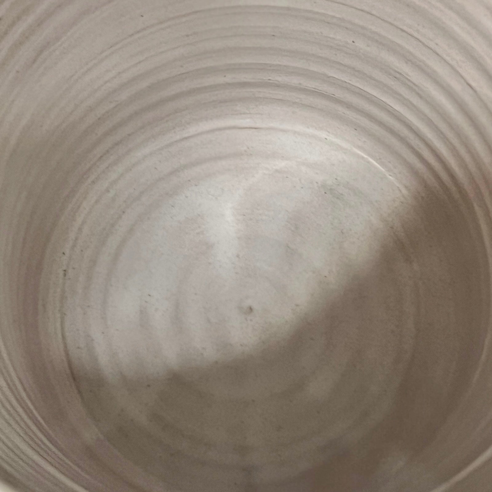 Close-up of a textured ceramic pot inside view