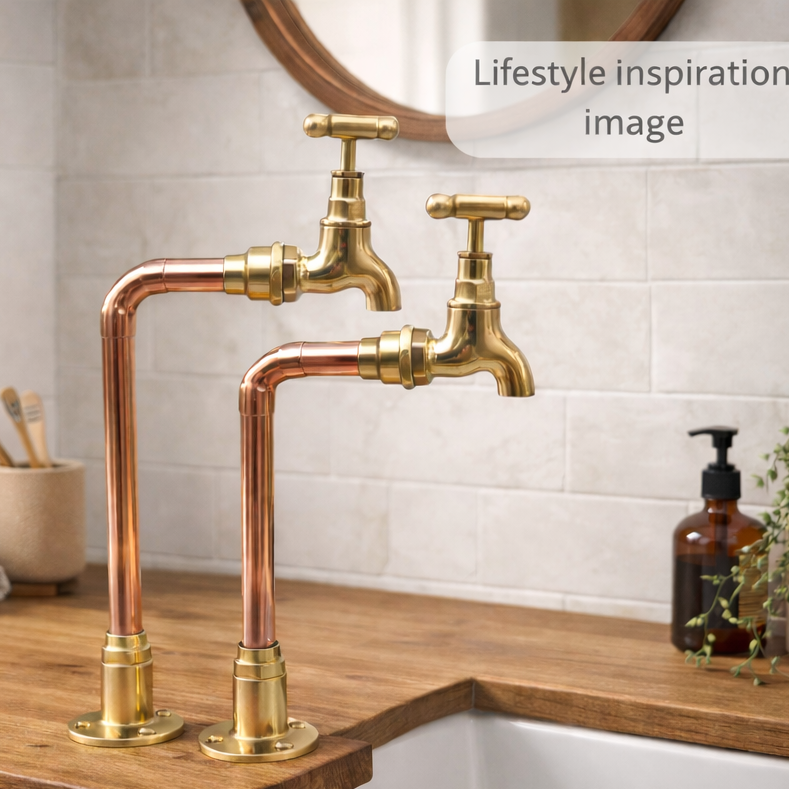 Bathroom sink with gold faucet and wooden countertop