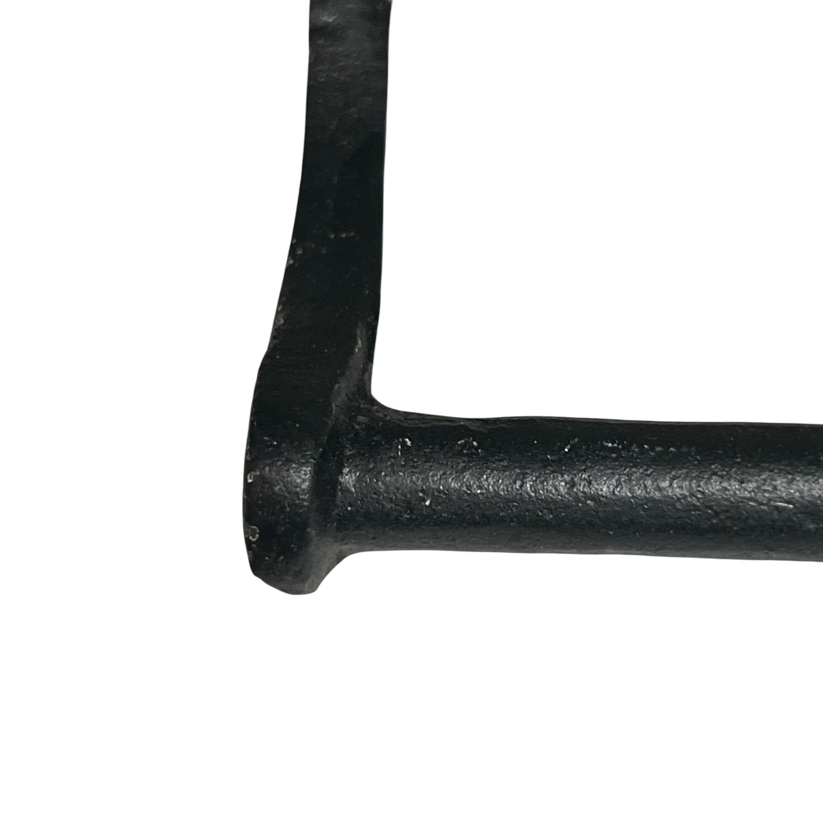 Close-up of a black metal handle on a white background