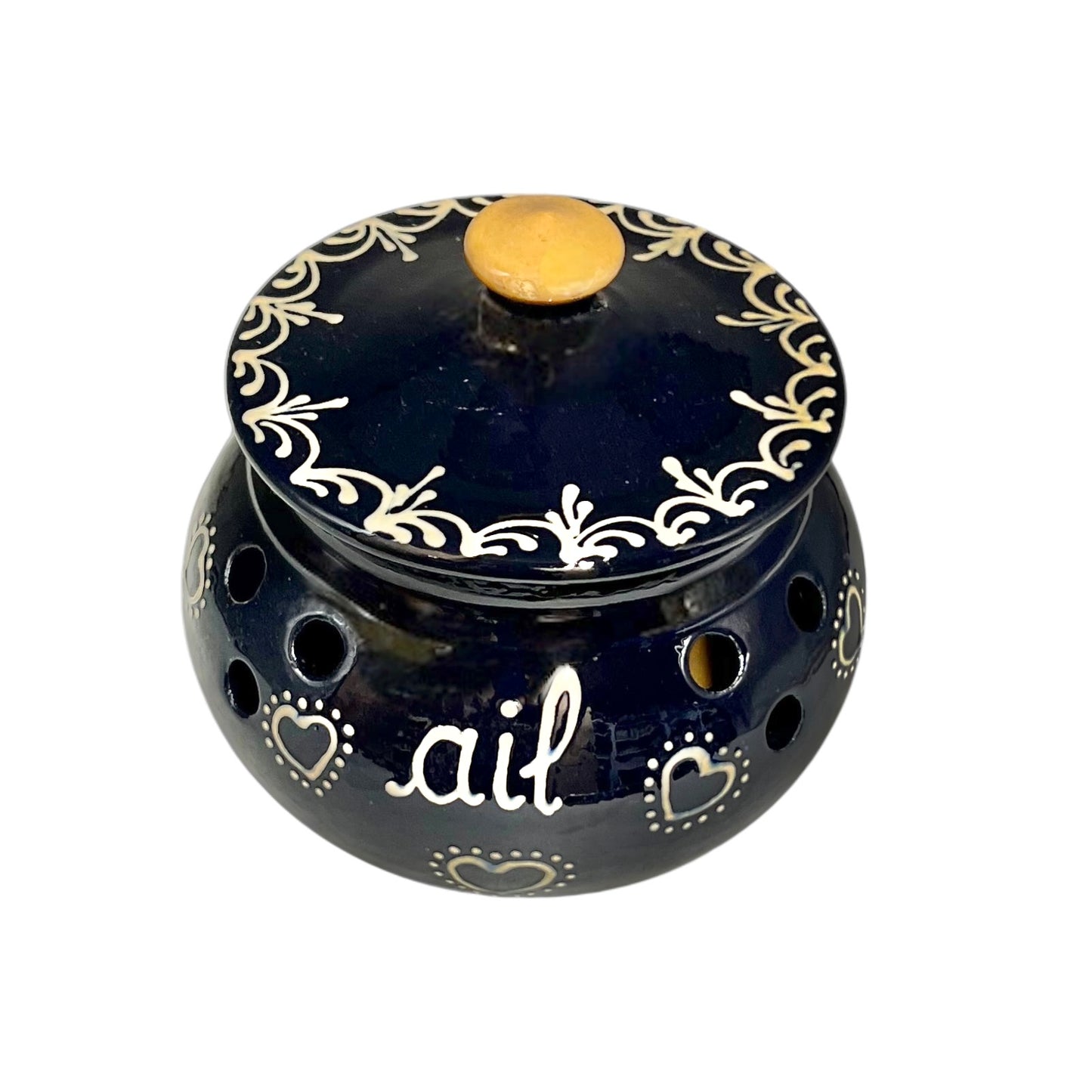 Decorative blue pot with white patterns and 'ail' text on a white background