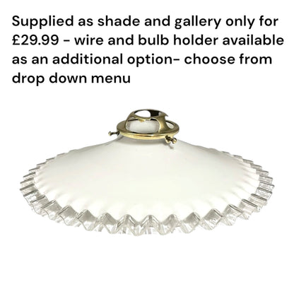 An off-white glass shade with a scalloped edge and a brass wire hanger, shown against a white background with black text explaining that the shade and gallery are supplied for £29.99 and the wire holder is available as an additional option.