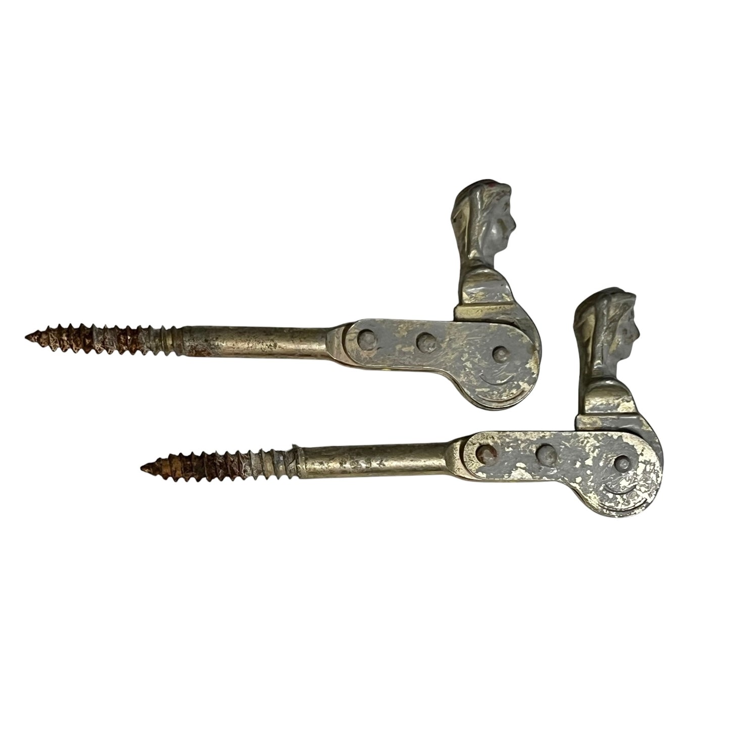 Two rusty metal Belgian ladies shutter dogs on a white background