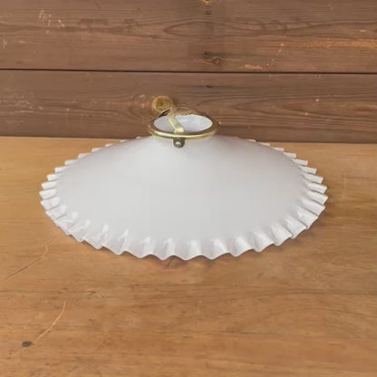 Video of a white glass vintage lamp shade 