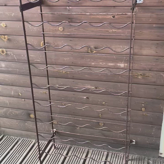 video of metal French wine cellar rack