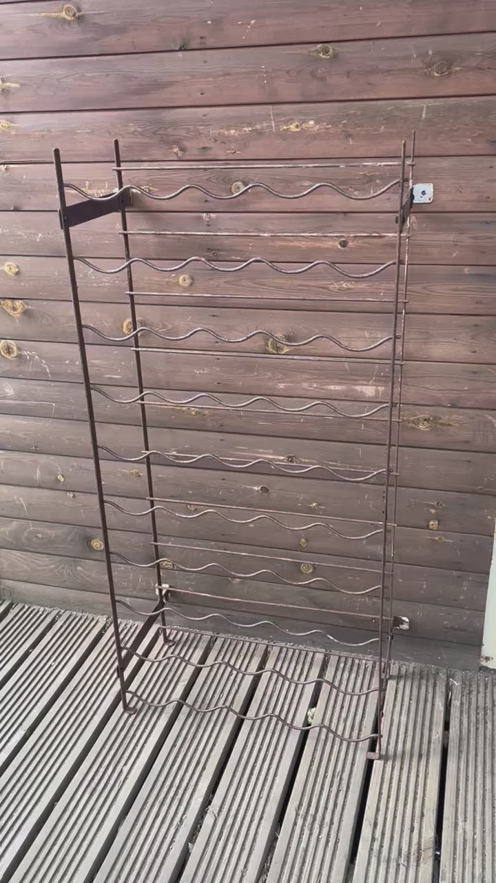 video of metal French wine cellar rack