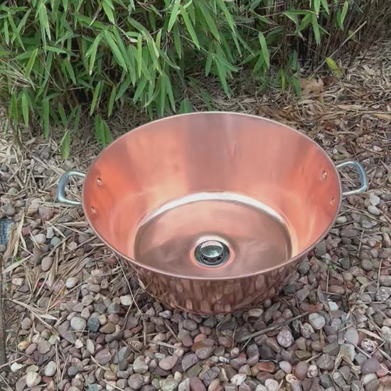 Video of copper up cycled basin in a garden 