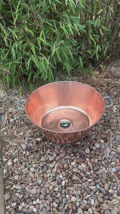 Video of copper up cycled basin in a garden 