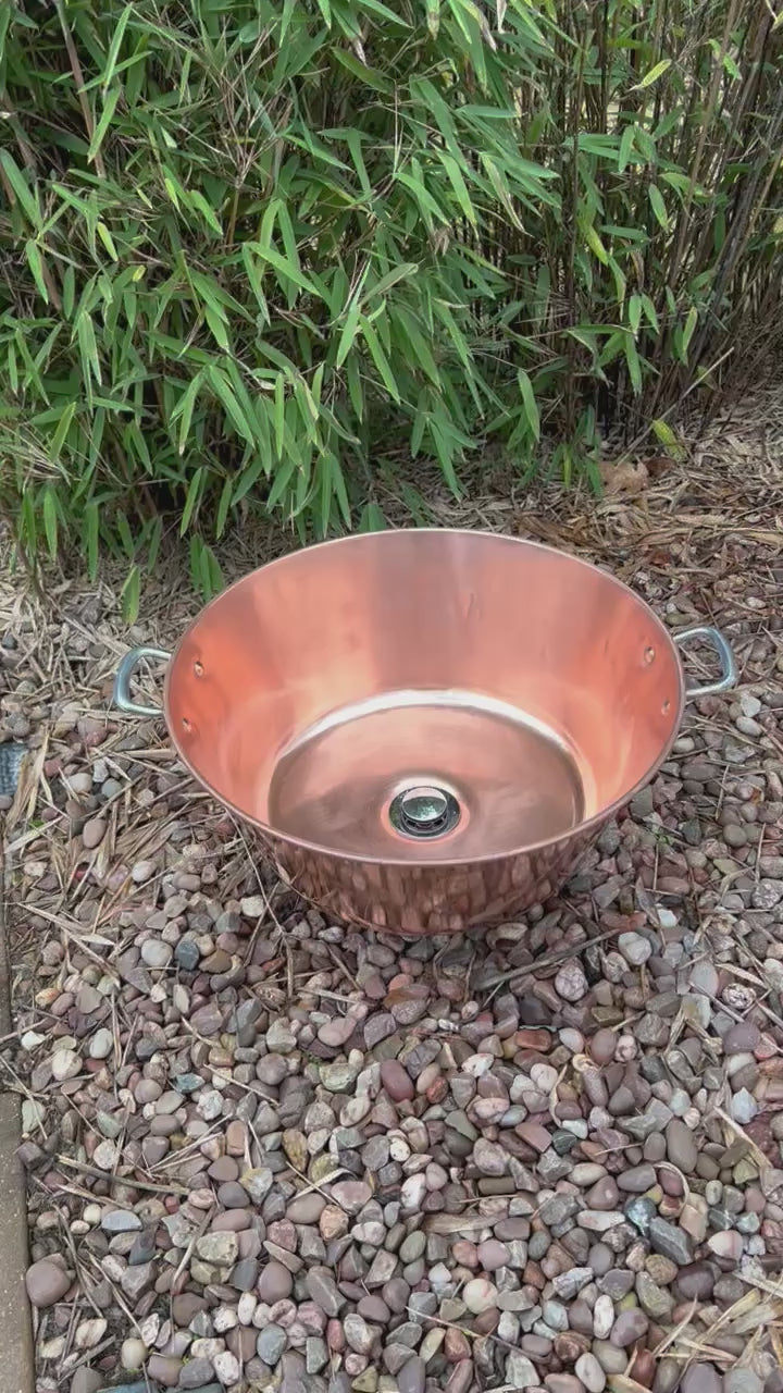 Video of copper up cycled basin in a garden 