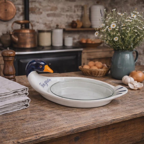 video of a French vintage foie gras dish on a farmhouse table 