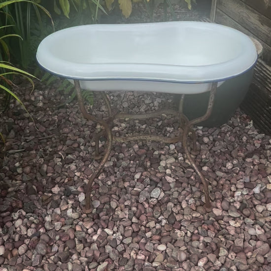 video of French vintage baby bath and stand 