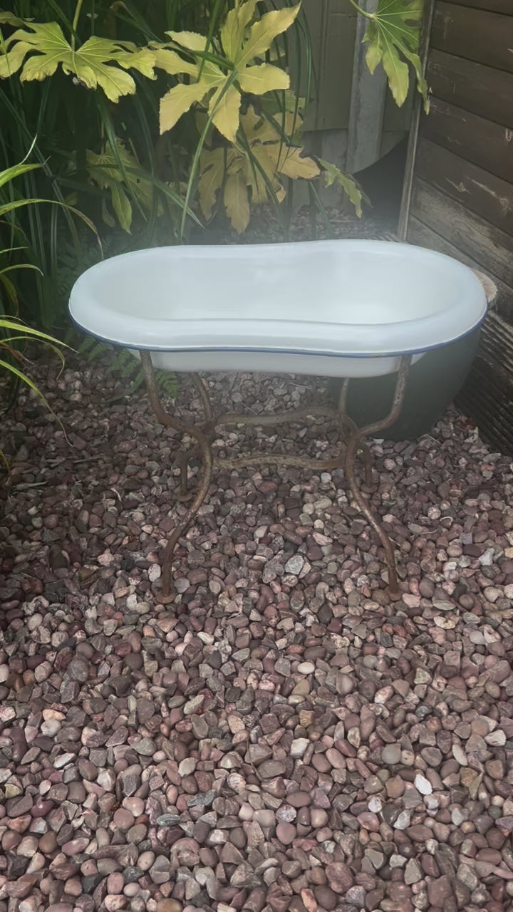 video of French vintage baby bath and stand 