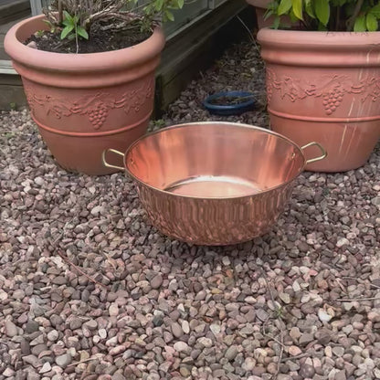 video of a copper up cycled sink basin in a garden setting 