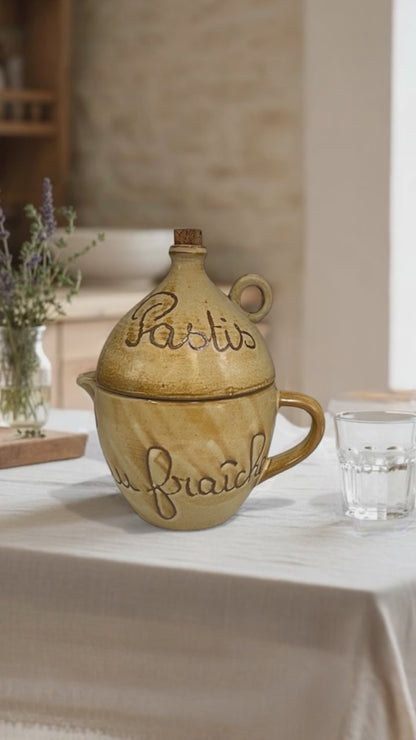 video of pastis and water jug