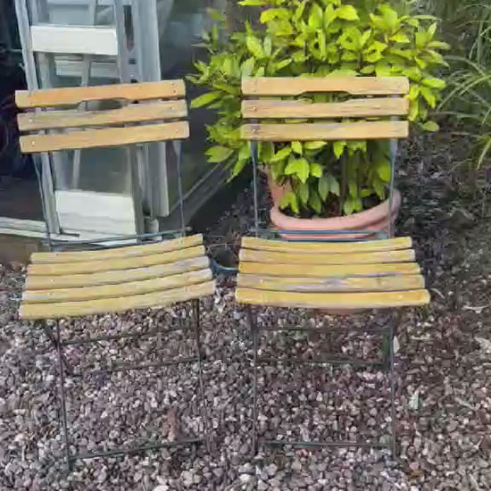 video of 2 French folding chairs 
