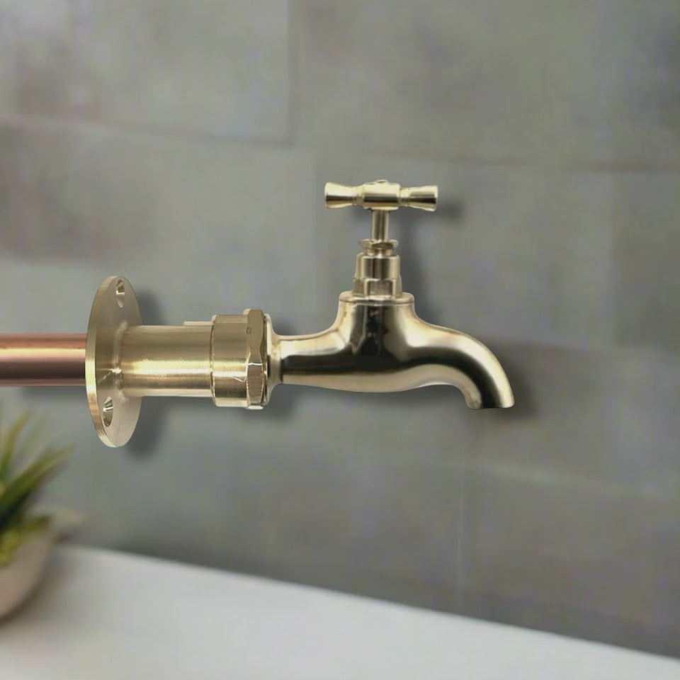 Video of bass tap with copper tail end on a grey background