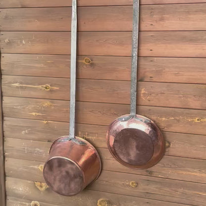 Video of 2 French copper long handled pans 