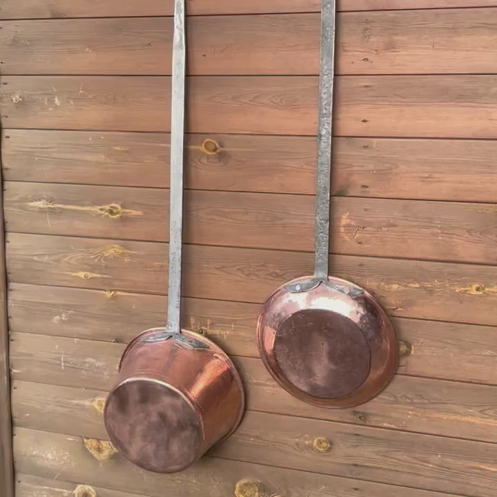 Video of 2 French copper long handled pans 