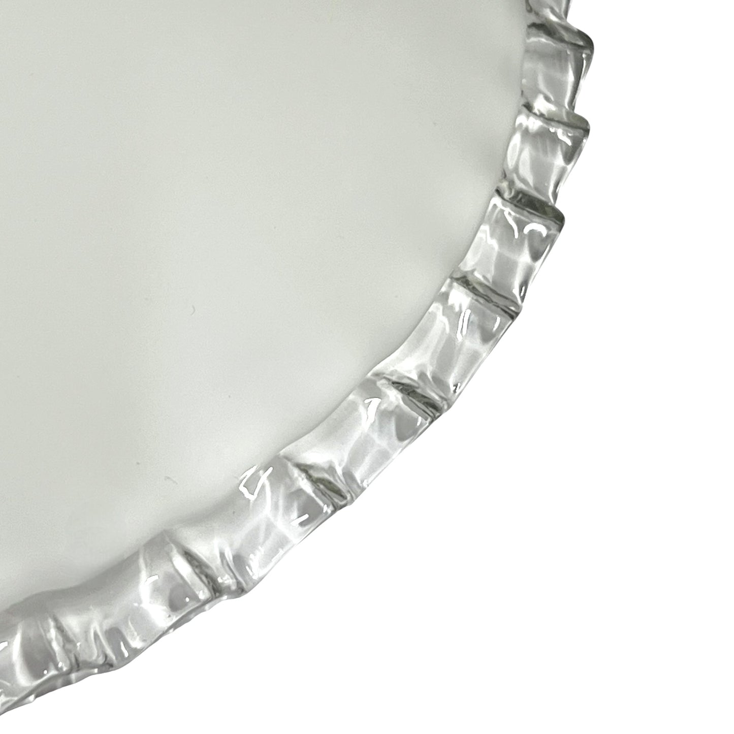 close up of rim on French vintage milk glass pendant lampshade on a white background 