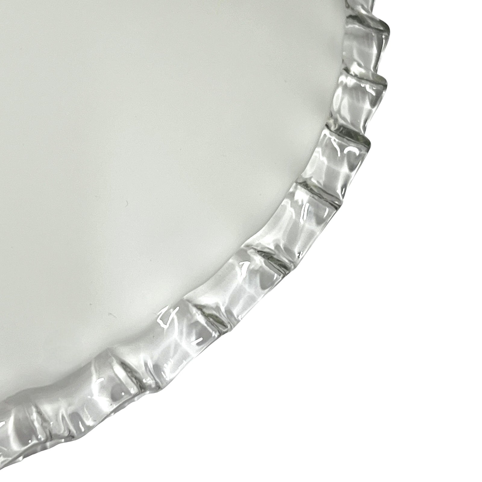 close up of rim on French vintage milk glass pendant lampshade on a white background 