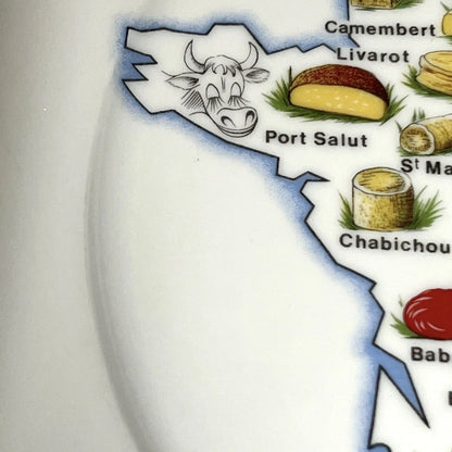 Map of France with illustrations of cheese and a cow, labeled 'Port Salut' and 'Chabichou'.