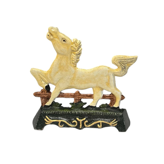 Small French Cast Iron Horse Door stop in the shape of a horse on a white background for sale from All Things French Store