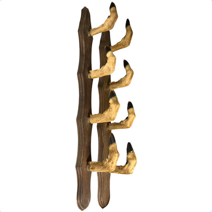 Decorative wall hook with deer hoof design on a white background