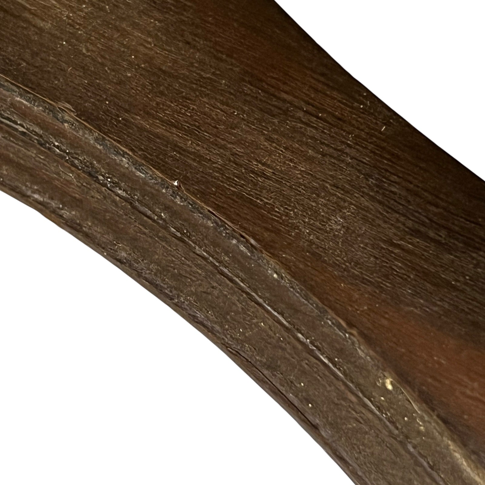 Close-up of a wooden surface with visible grain and texture