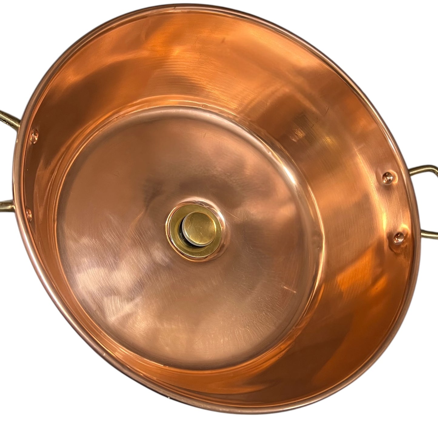 Copper pot with a central brass fitting on a white background