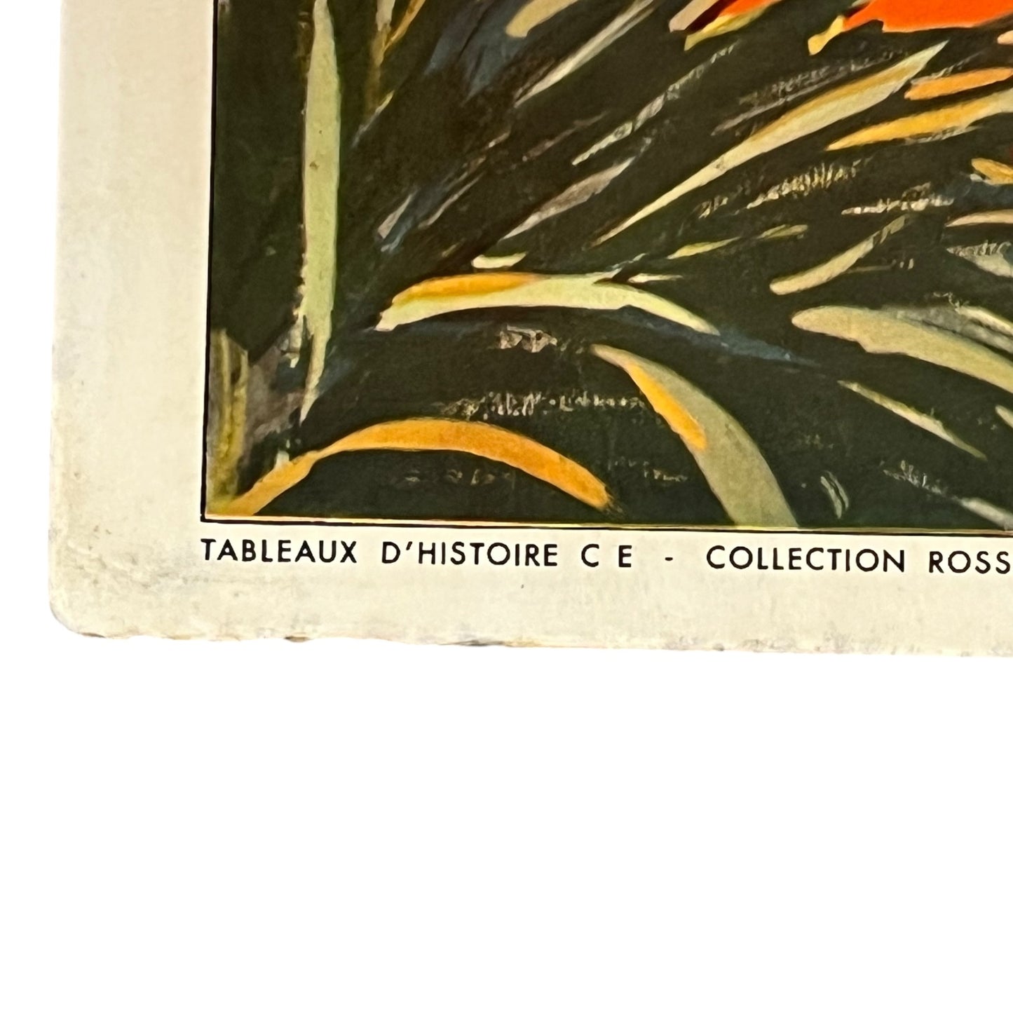 Corner of a book or paper with text on a white background