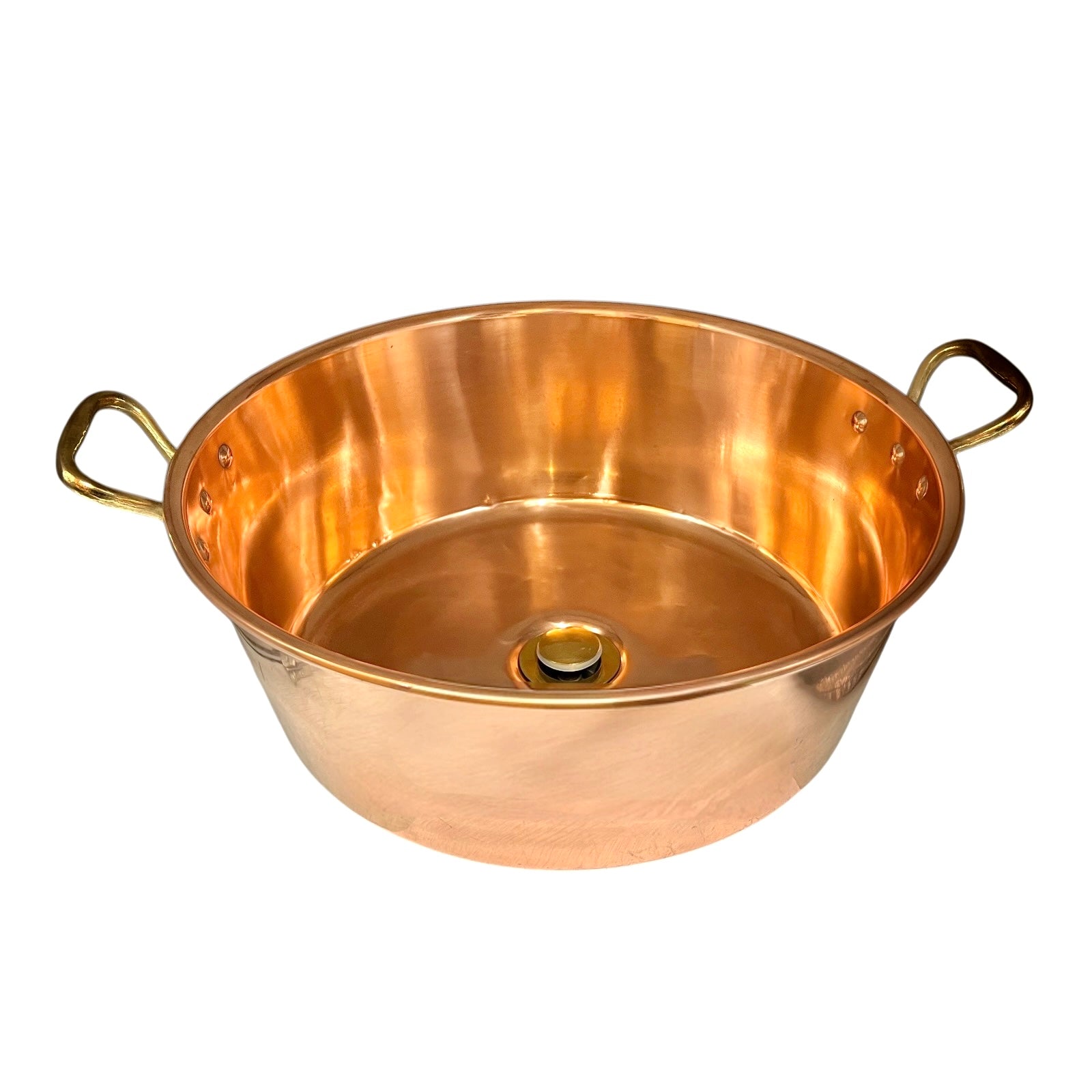 A copper- vintage bathroom sink with two loop handles on a plain white background.