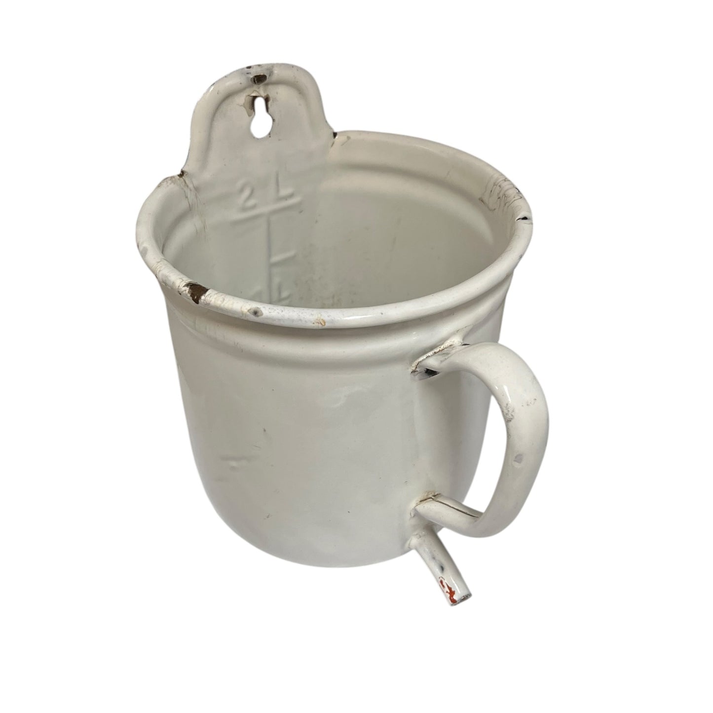 A vintage white enamel measuring pot with embossed 2L measurement markings, a side handle, and a small spout, shown on a plain white background.