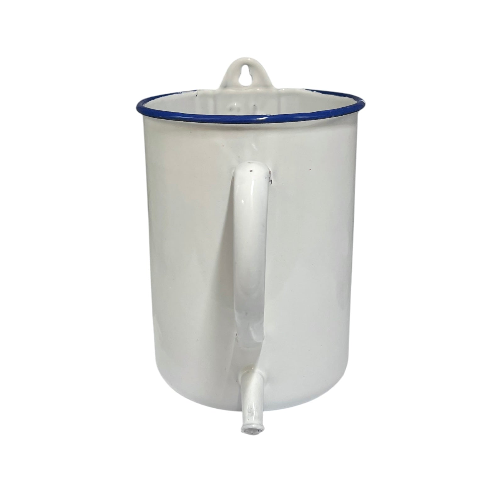 A white enamel mug with a blue rim, featuring a built-in handle and a small spout, shown against a plain white background.