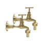 Pair of brass wall mounted taps sold by All Things French Store