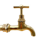 image of a single copper and brass tap head