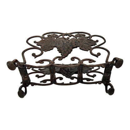 underside of French vintage cast iron magazine rack sold by All Things French Store 