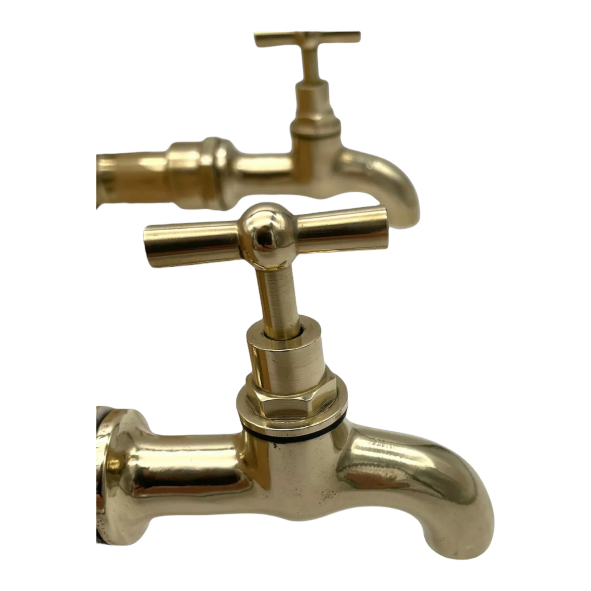 image of a pair of 3/4 inch wall mounted brass taps  handle view