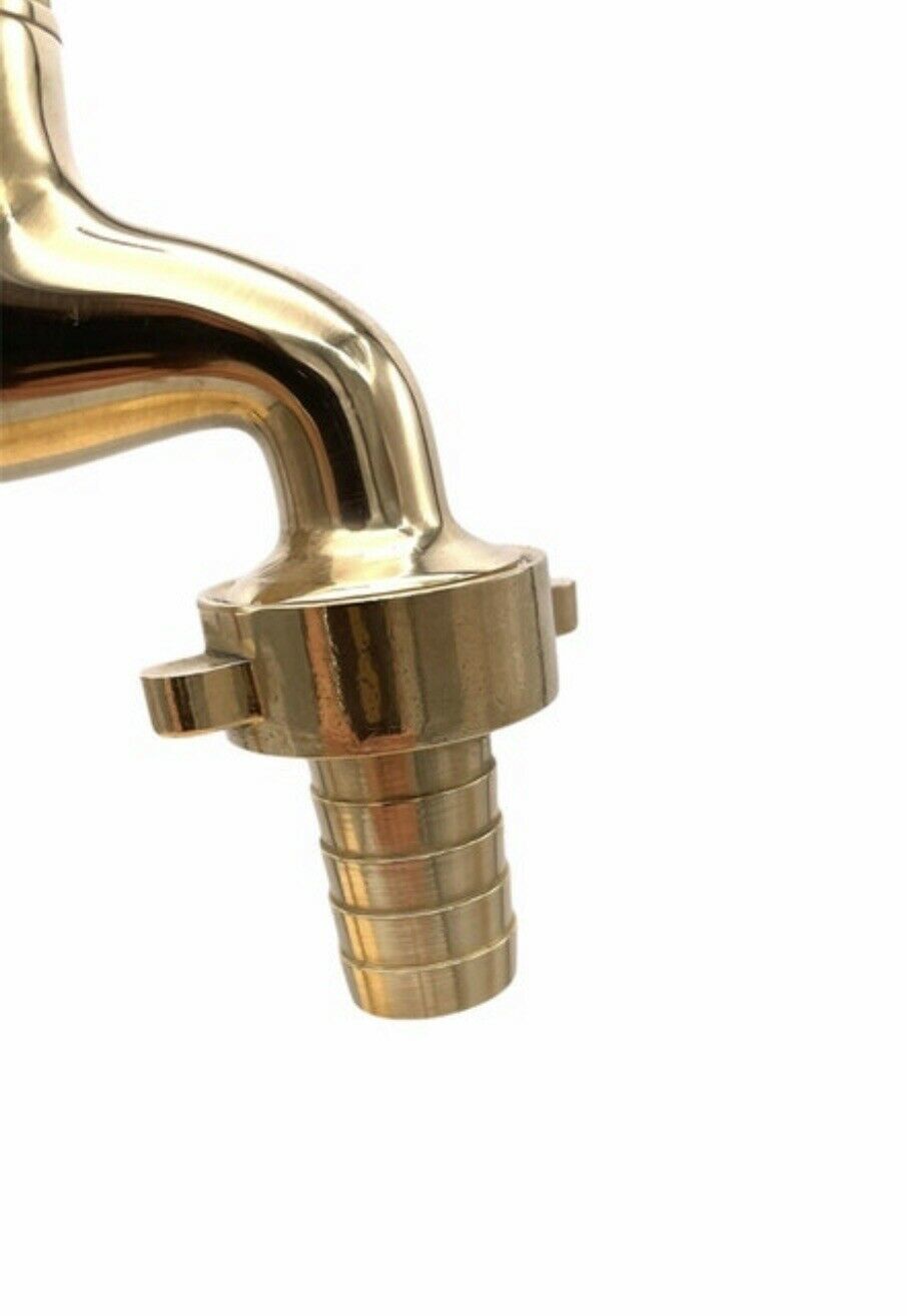 Pair of wall mounted brass and copper taps with detachable nozzles sold by All Things French Store